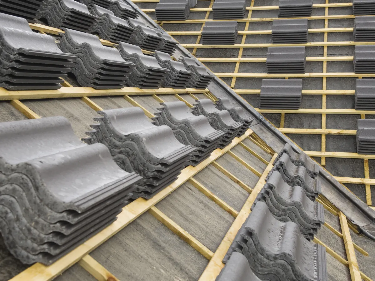 Close view of dry ridge roofing work in progress